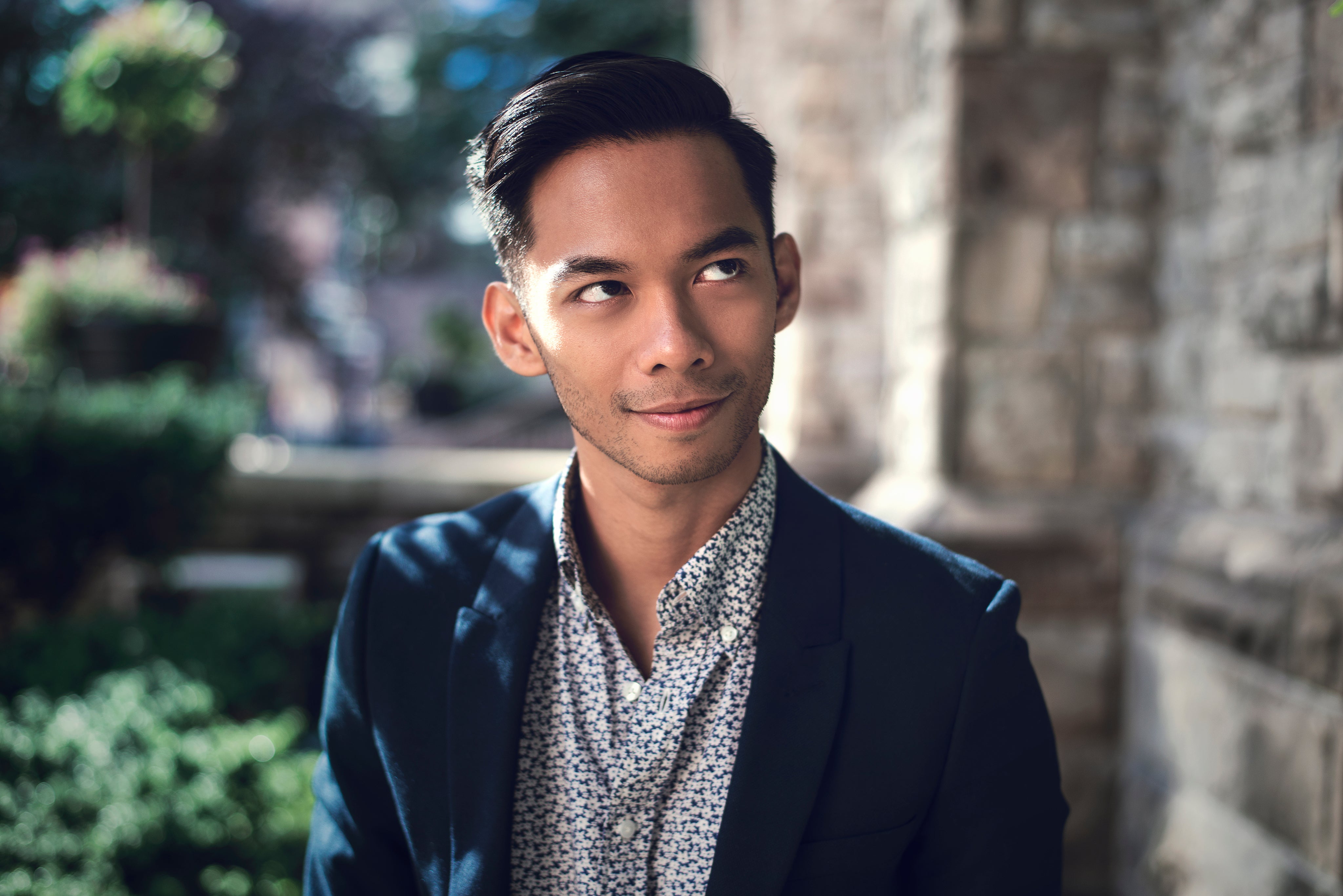 files/friendly-man-smiling-and-looking-to-the-side.jpg